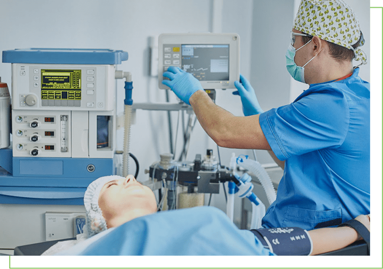 anesthesiologist working on machine during surgery